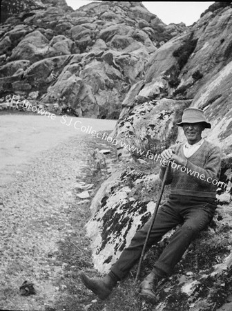 OLD MAN AT ROADSIDE